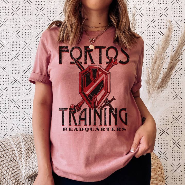 Parchment & Parcel - Wholesale Screen printed t-shirt – Women′s - Fortos Training Headquarters T-Shirt | Kindred's Curse Saga4