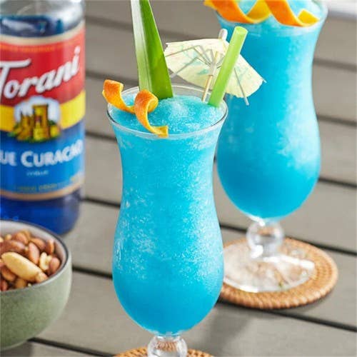 Torani Blue Curacao Flavoring Syrup 750 mL Glass Bottle WS-999362948 for wholesale by FIXTUREDISPLAYS