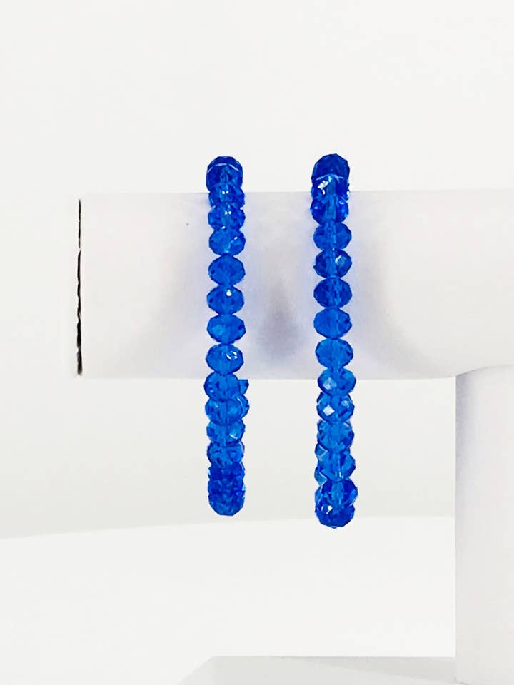 Medium Royal Blue Stretchigt Glaspärlarmband för wholesale av Magnolia & Peach Jewelry Boutique, LLC