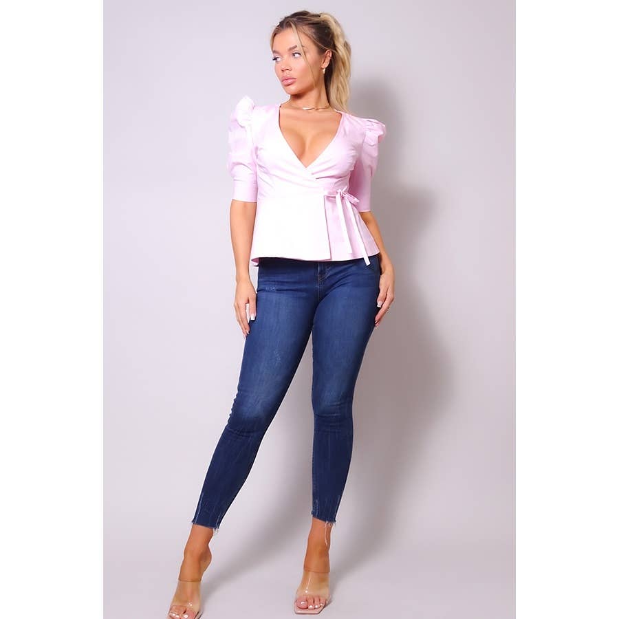 PINK LT SKY BOW WRAP TOP for wholesale on Faire1