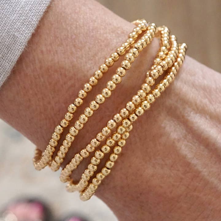 Dainty Gold Beaded Bracelet Stack – Set of 5 for wholesale by PennyLine inc