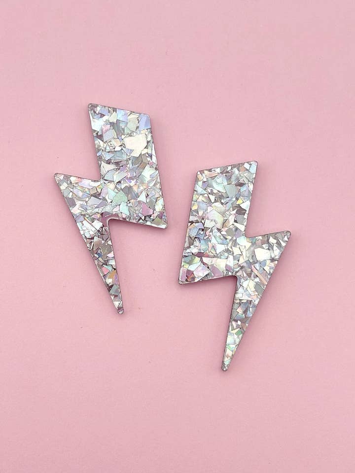 Maxi Glitter Lightning Earrings in Holographic Silver for wholesale by Studio Annette