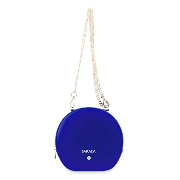 Mini sac en cuir de vachette et couleur bleu électrique. pour la vente par BARADA UBRIQUE