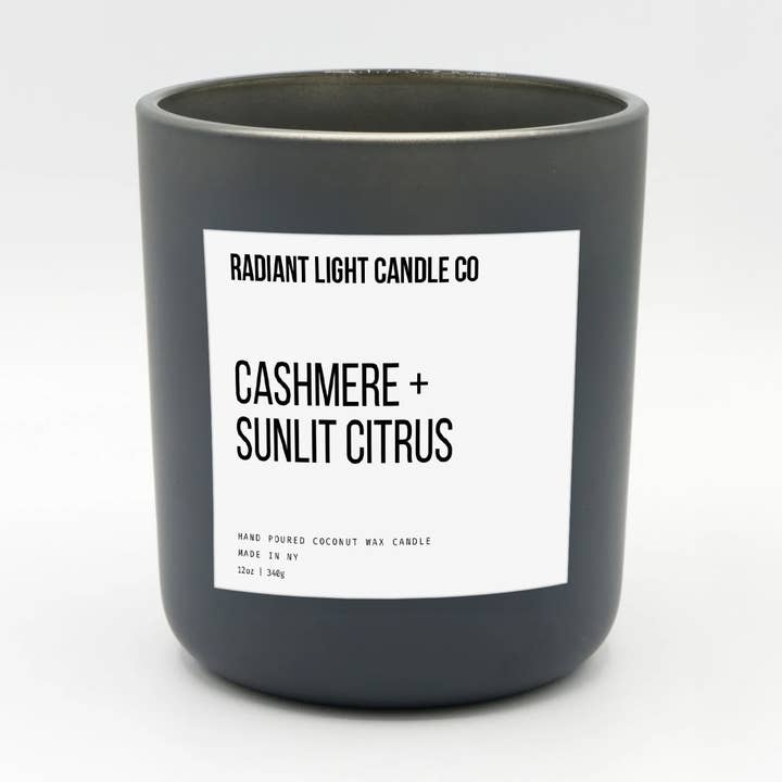 Cashmere + Sunlit Citrus 12oz Scented Matte Black Candle for wholesale by Radiant Light Inc