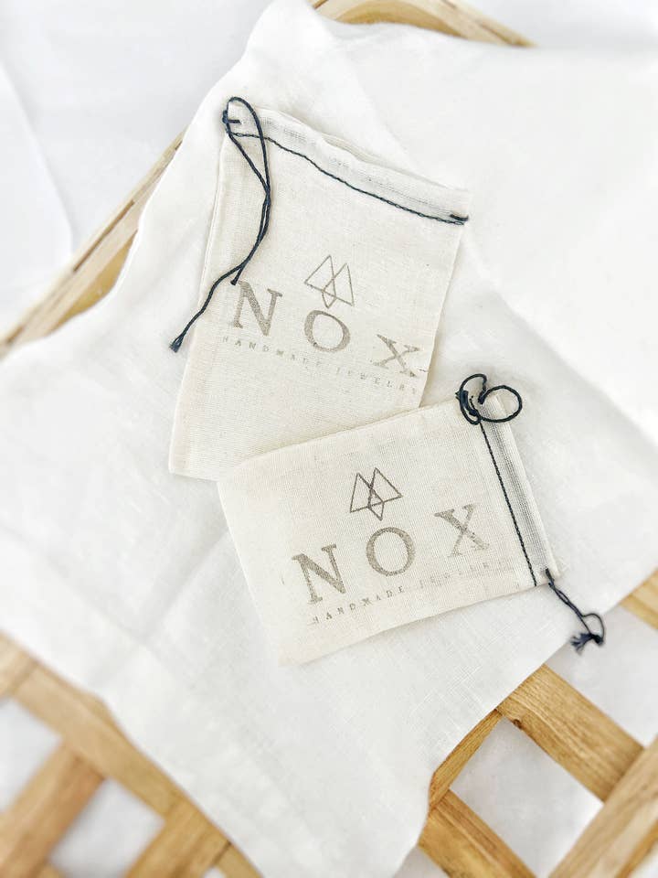 Cotton Dust Bag with NOX Logo for wholesale by Nox Jewelry
