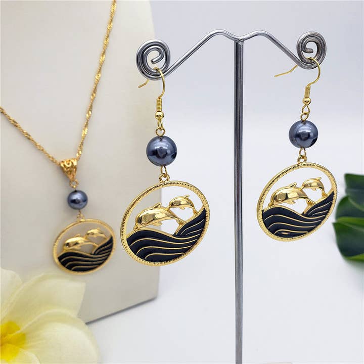 Set Of Hawaiian Wheel Of Ocean&Dolphins Earrings And Necklace In Silver\Gold Sustained With A Petrol Pearl for wholesale by S&T Collections