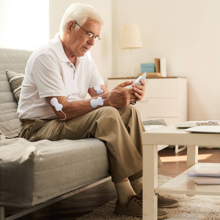 White Electric Muscle Stimulator Dual Channels Pulse Massager Pain Relief Therapy Tens Device with Electrode Pads Wires for wholesale on Faire9