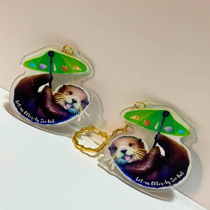 Llavero acrílico Sea Otter, pies Lotus, conchas marinas y divertido juego de palabras para venta al por mayor de Jenuine Heartfelt Design