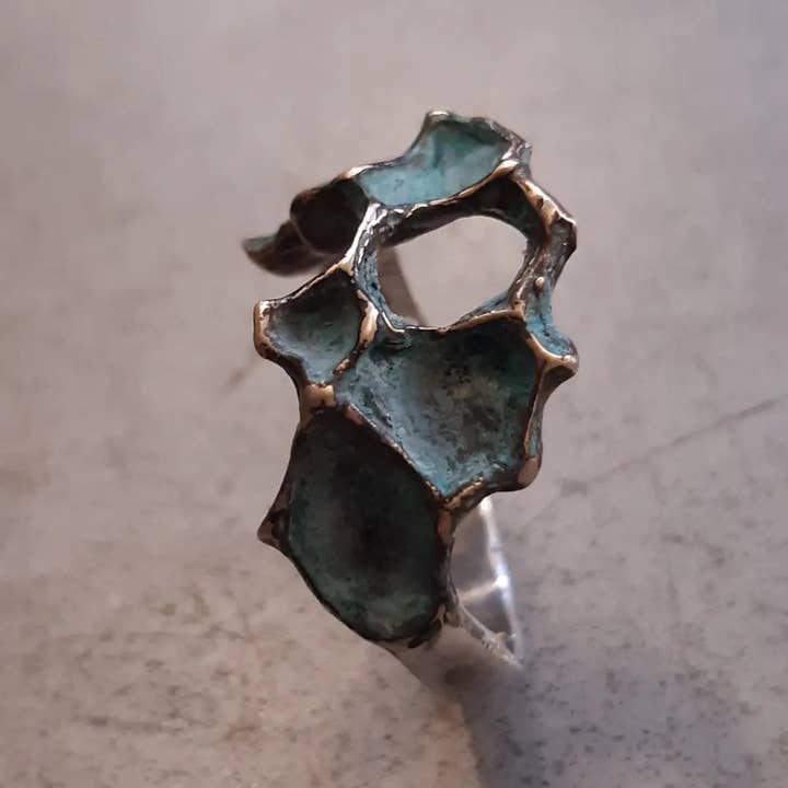 Pomegranate ring with turquiose or black patina. for wholesale by Beca Beeby