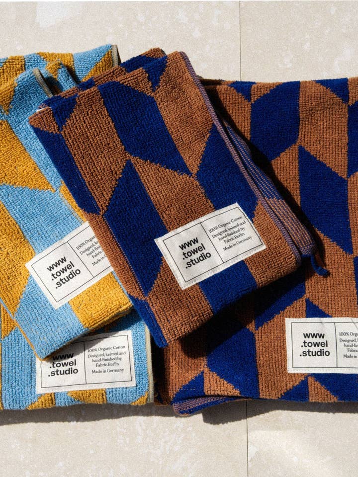 Pilhale 4 stk. sæt | Bade- og gæstehåndklæder x 2 farver | Azur & Kastanje + Karamel & Himmel for engroshandel hos towel.studio