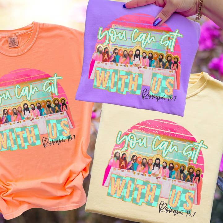 You Can Sit With Us Romans 15:7 (Choose Your Tee Color) for wholesale by The Red Rival Wholesale