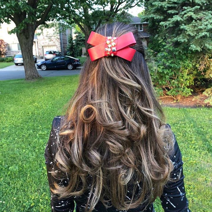 Faux Leather Studded Bow Barrette for wholesale by Hettie Hair Accessories