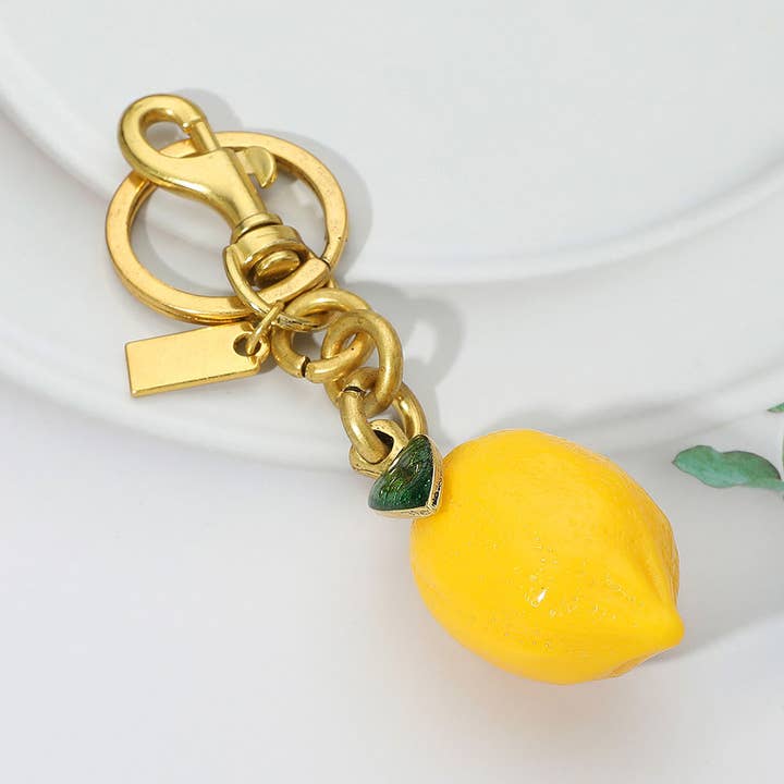 Porta-chaves / Pendente de Mala Limão por atacado de Sensibling Corp.