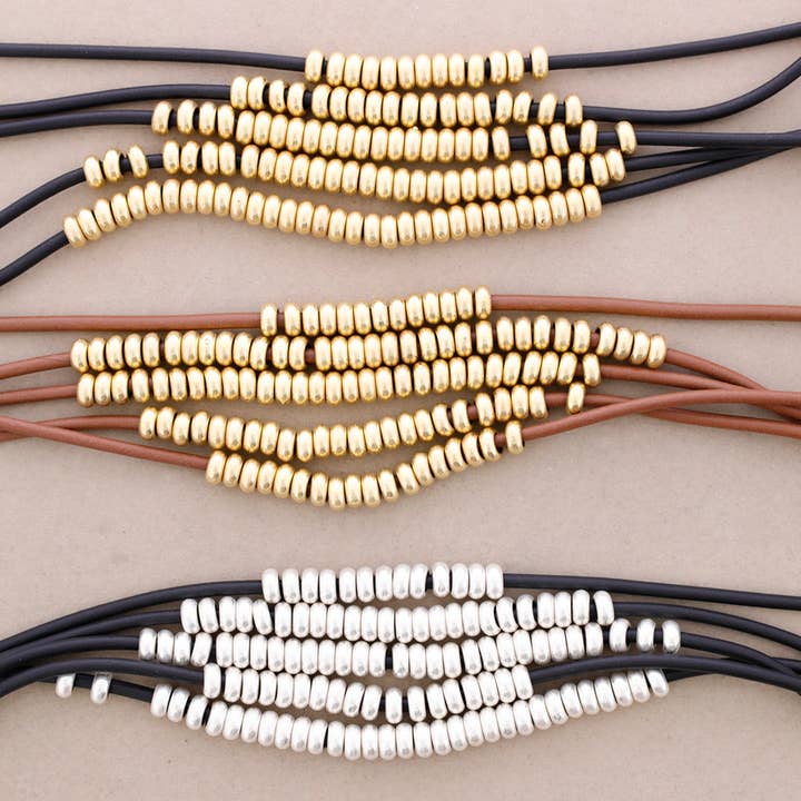silver Five Tier Rubber Choker with Metallic Balls for wholesale on Faire