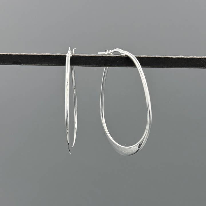 Silver Medium Graduated Teardrop Hoops for wholesale by Something Silver