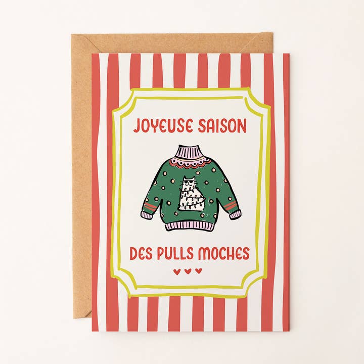 Cartolina di Natale Maglione Brutto Gatto Colorato (Francese) per la vendita all'ingrosso da parte di Art Prints by Rio Soléy