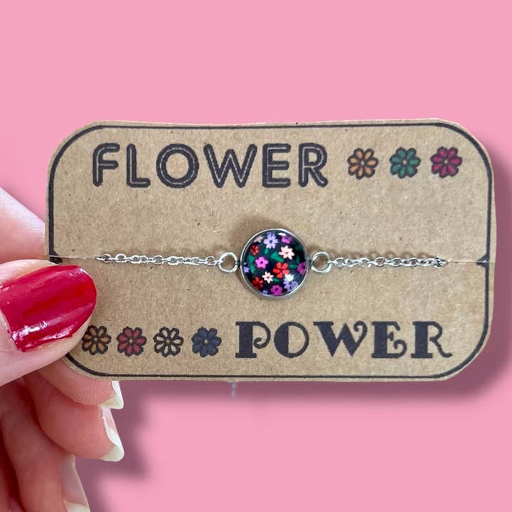 Stainless Steel Bracelet with Pink and Red Flowers on Black Background for wholesale by Dans l'Air du Temps Bijoux