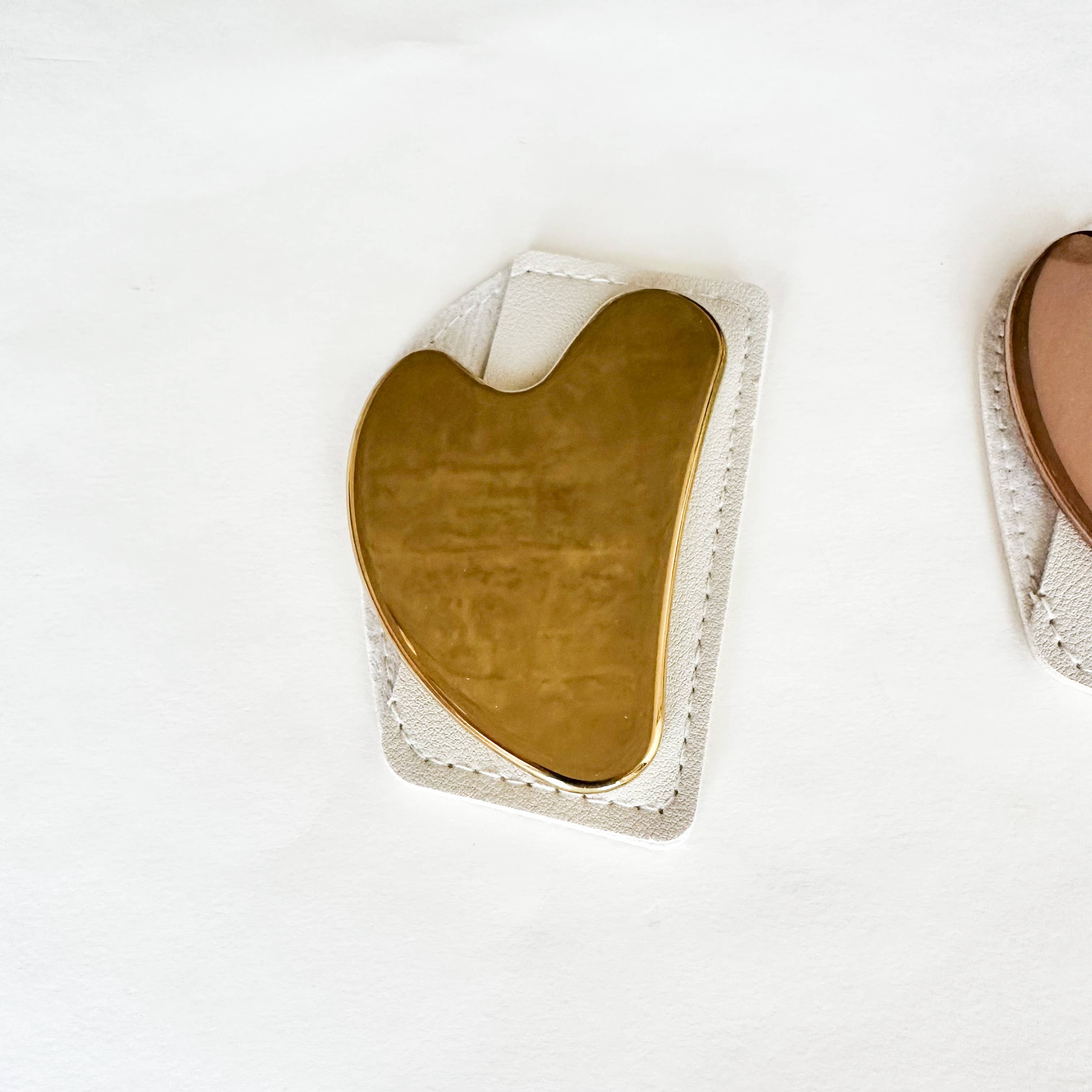 Smile Boutiques - Vente Gua Shas - Gua Sha en acier inoxydable avec étui en cuir2