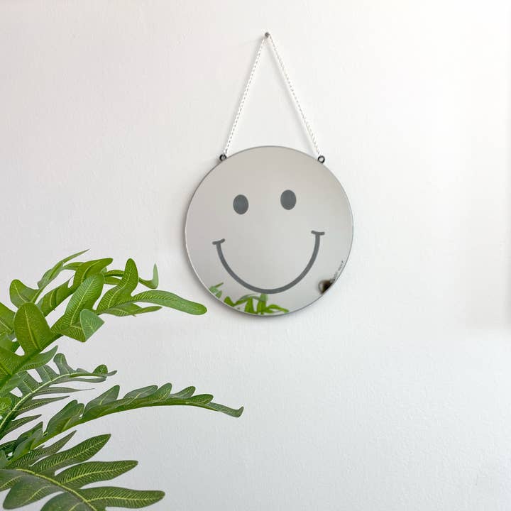 Smiley face silver mirror for wholesale by DOODLE MOO LTD