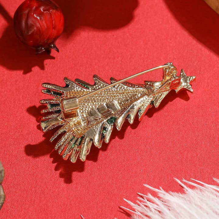 Green Enamel Christmas Tree Brooch with Red Rhinestones for wholesale on Faire1