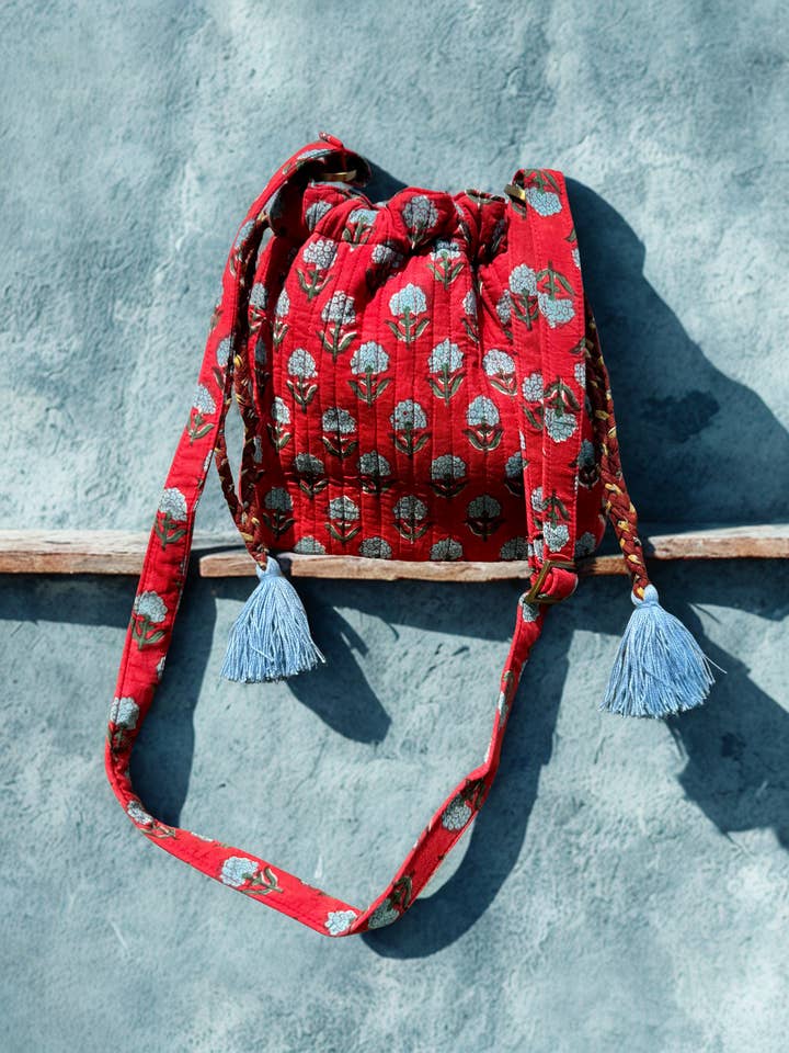 Block printed Garden Wayfarer Crossbody Bucket Bag (Red) for wholesale by House of Mulmul LLC