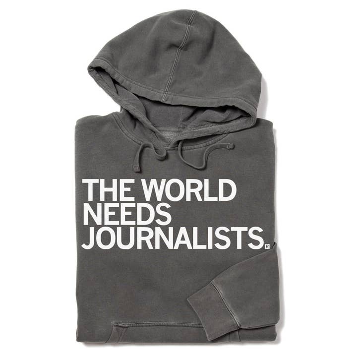 Le monde a besoin de journalistes Pull à capuche pour la vente par RAYGUN