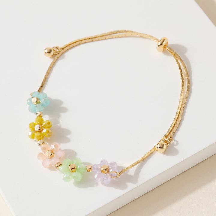 StarryNYC - Vente Bracelets à breloques/pendentifs - Bracelet à nouer avec chaîne cobra en forme de couronne de fleurs en perles2