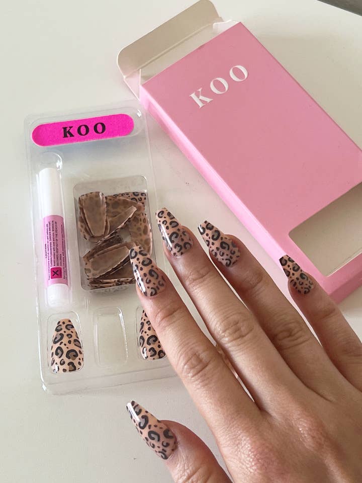 Leopardo per la vendita all'ingrosso da parte di Koo Pink