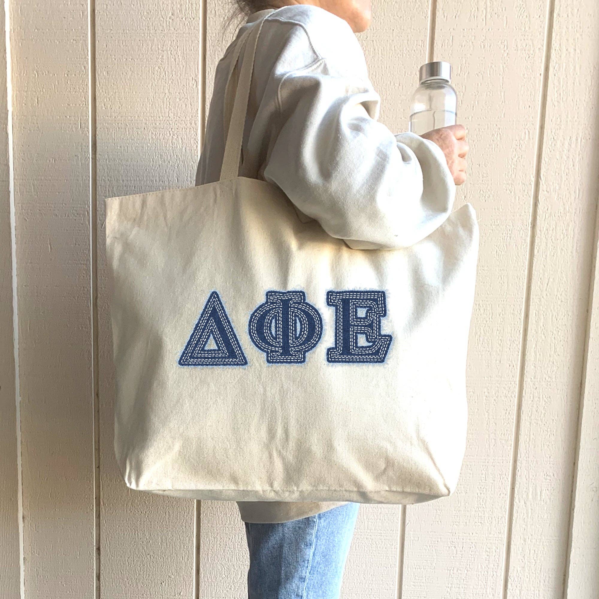 Natural Sorority Greek Letters Printed on a Canvas Tote Bag for wholesale on Faire15