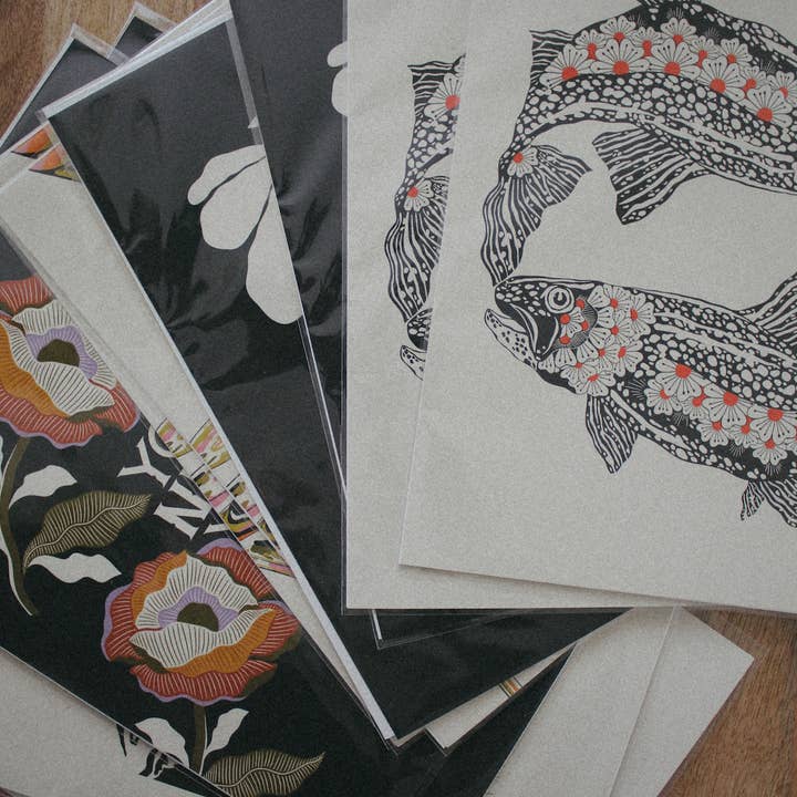 White 'Fish Love' Print by Parrott Paints for wholesale on Faire