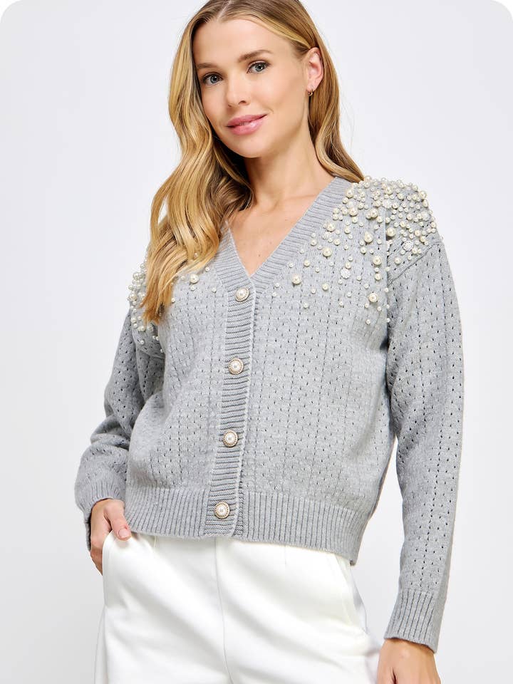 Cardigan en tricot à œillets orné de perles pour la vente par Strut & Bolt