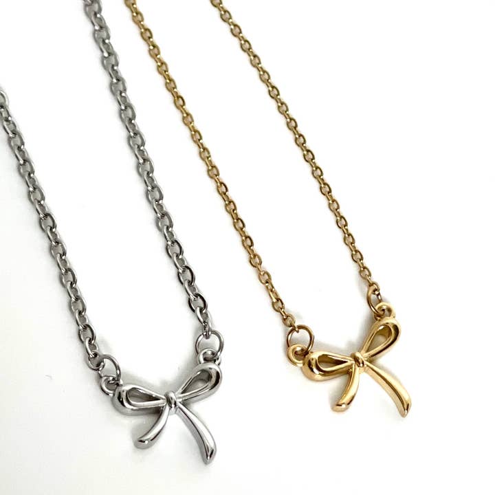 L Rae Charm - Wholesale Pendant/Charm Necklace - Bow Necklace. Sugar & Spice