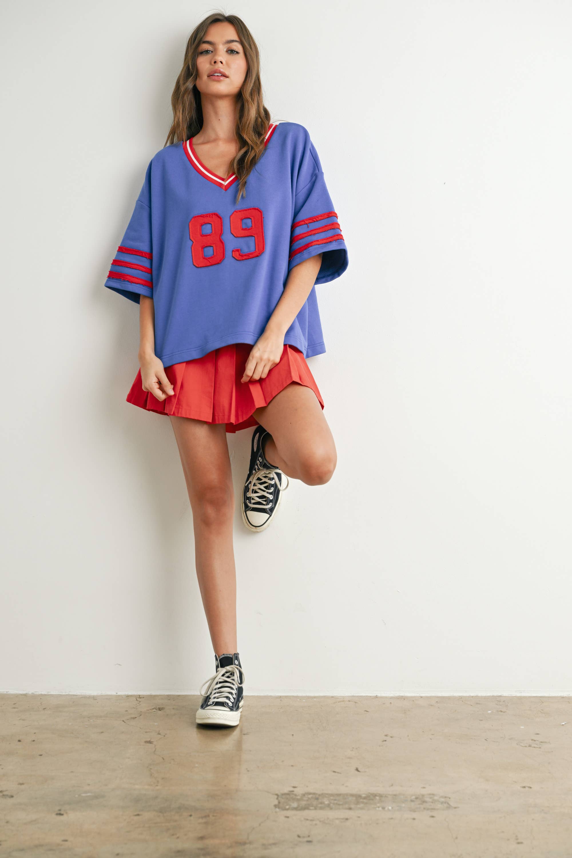 BUTTERMELON - Vendita all'ingrosso Maglietta - Donna - Maglia oversize sporty Varsity Spirit - BMT773415