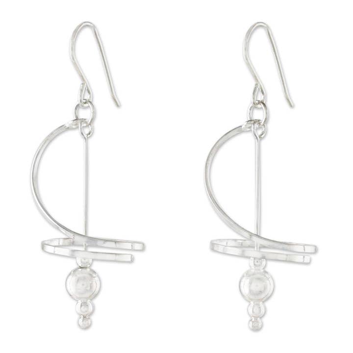 NOVICA Pirouette Boucles d'oreilles pendantes en argent sterling pour la vente par NOVICA