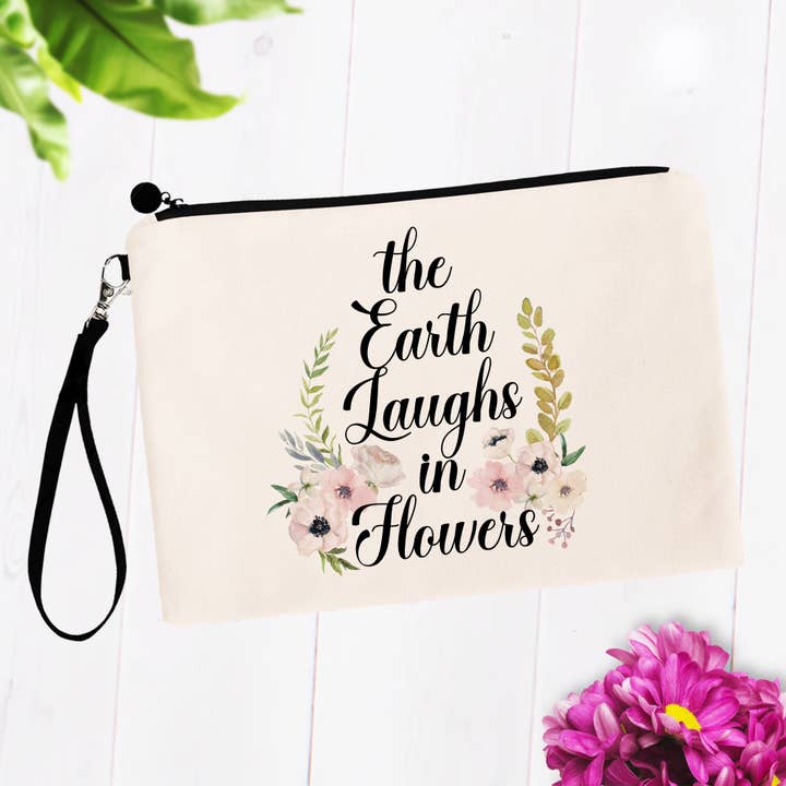The Earth Laughs in Flowers Makeup Bags for wholesale by SheMugs