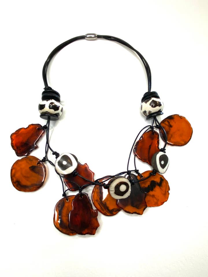 Brown acrylic disc and batik dyed bone necklace for wholesale by Phyllis Clark