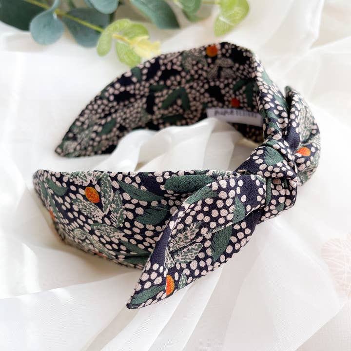 Side Bow Headband - Womens Hair Accessory - Navy Floral Spot for wholesale by Nine Designs Ltd