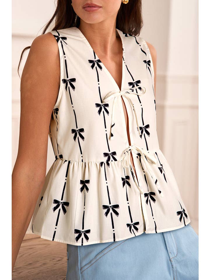 White Bow Tie Front Peplum Top for wholesale on Faire