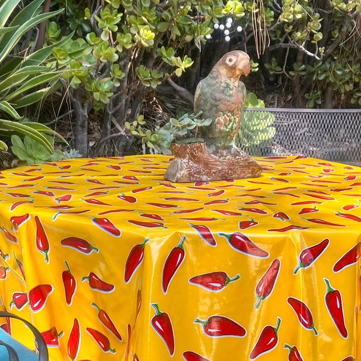 Yellow Chiles 68" Round for wholesale by Oilcloth International