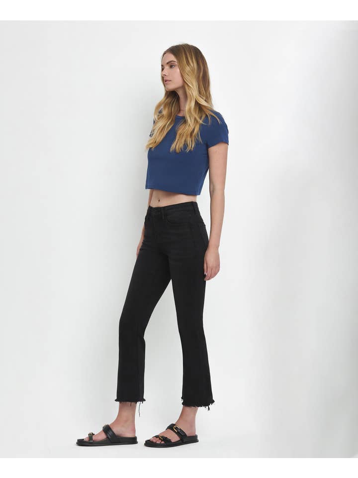 GRANDIOSITÀ JEANS CROP FLARE A VITA MEDIA CON ORLO INVECCHIATO E ORLO GREZZO LV1145 in vendita all'ingrosso su Faire12