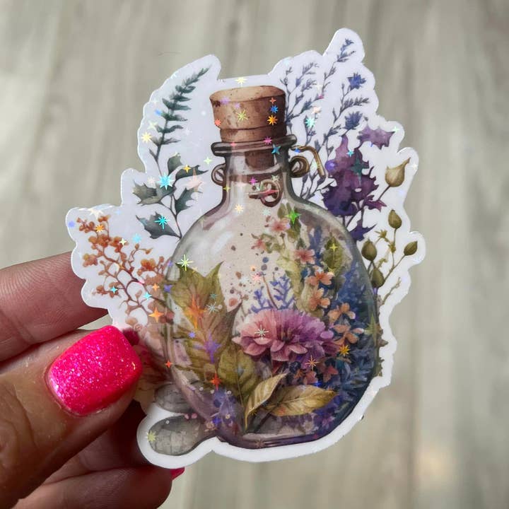 Autocollant en vinyle découpé en forme de bouteille de potion magique pour la vente par Prairie Chicken Sticker Shop & Gifts