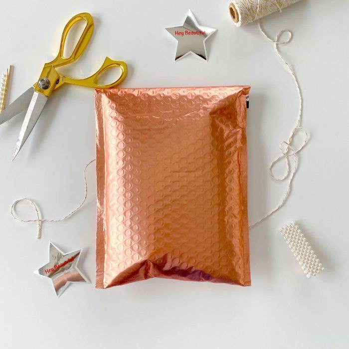 6.5x10 Rose Gold Metallic Poly Bubble Mailers for wholesale by Eleven Fashion