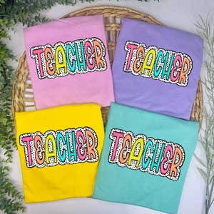 Purchase Wholesale teacher shirts. Free Returns & Net 60 Terms on Faire