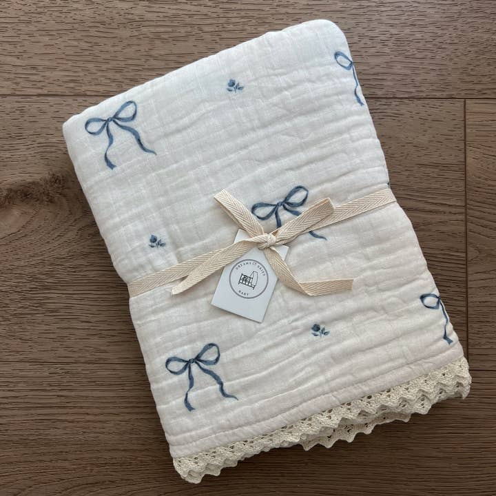 Blue Bows 6 Layer Gauze Blanket and other Purchase Wholesale bluey blanket. Free Returns & Net 60 Terms on Faire trending on Faire.