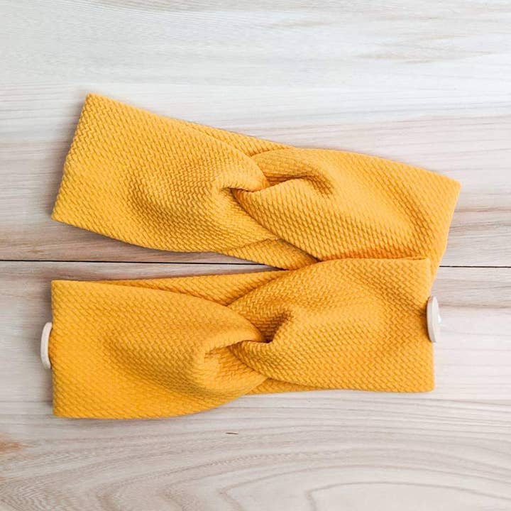 Bandeau nœud moutarde pour la vente par Square Lane Boutique