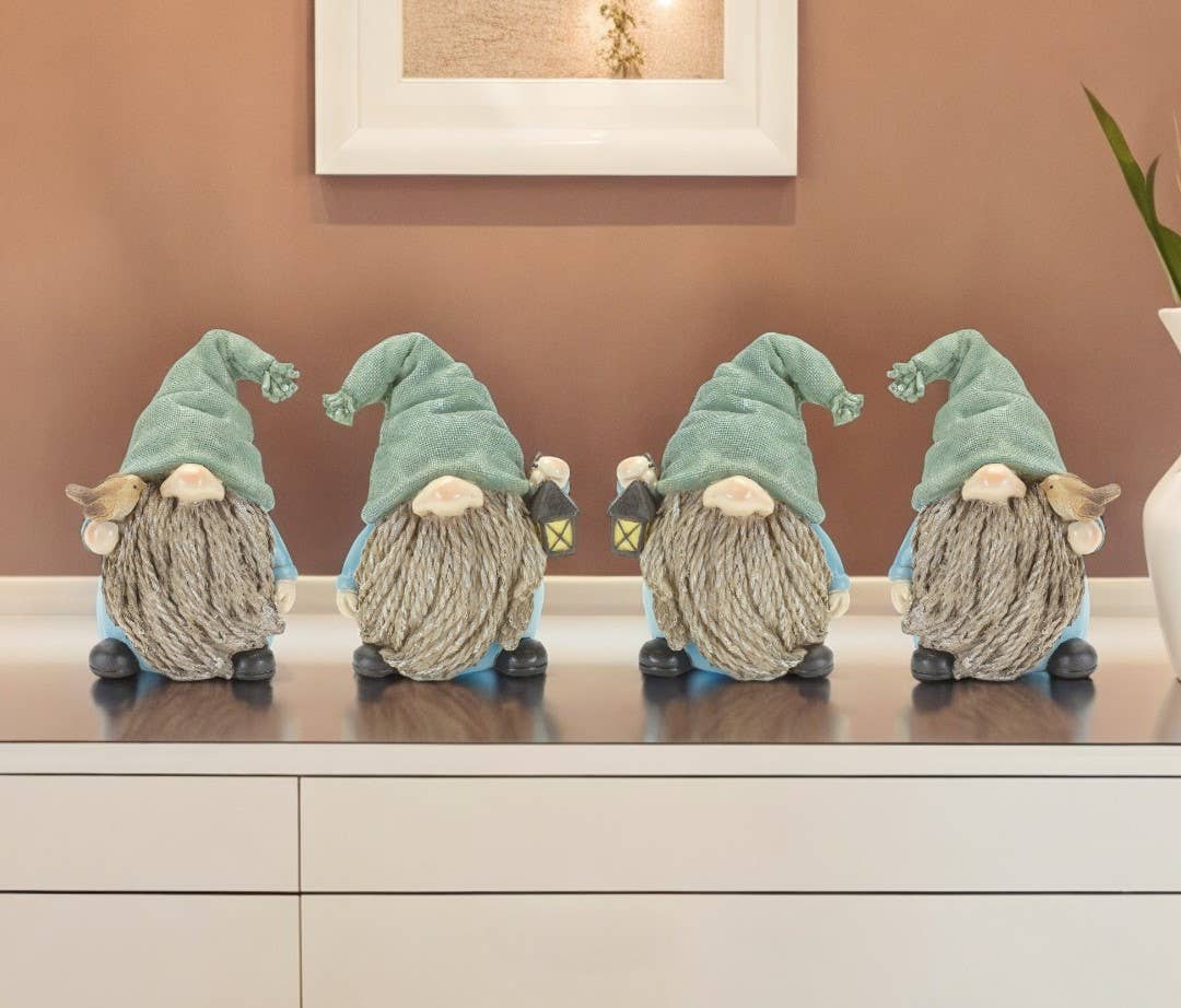 HomeRoots – wholesale Decorative tabletop object – Set of 4 6"Blue and Green Sitting Gnome Tabletop Sculpture1