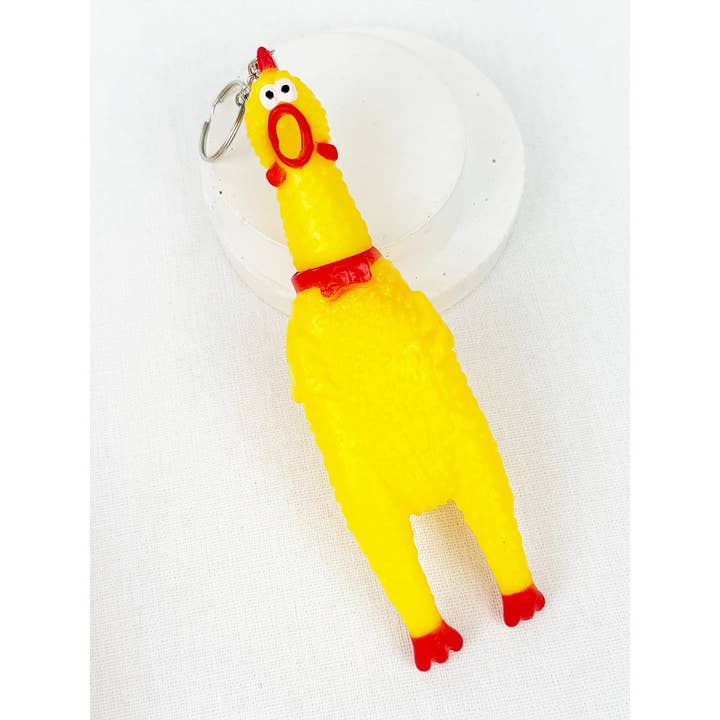 YELLOW Squeeze Chicken Keychain for wholesale on Faire