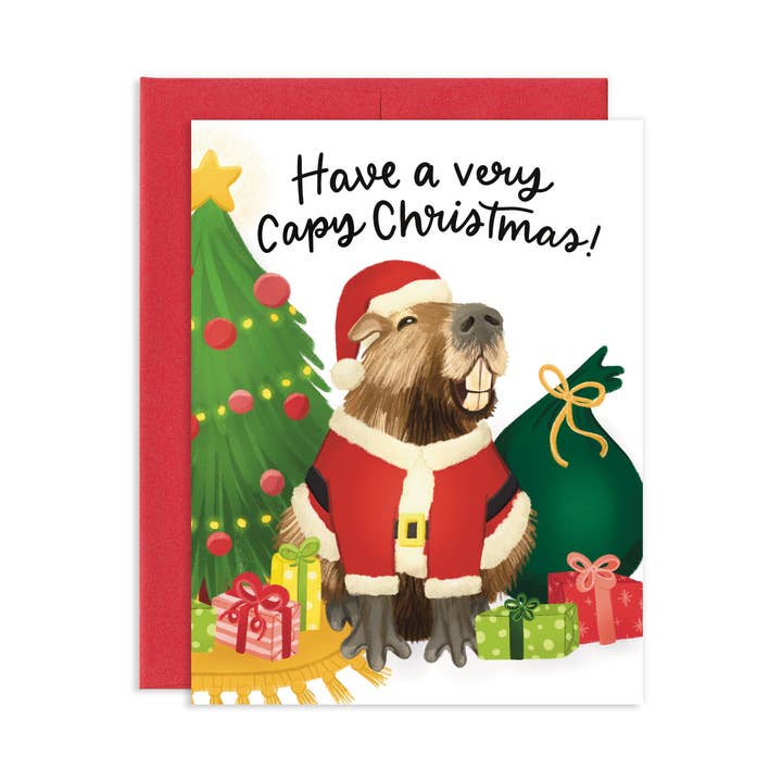 Capybara souriant - Chapeau de Père Noël - Carte de vœux de Noël pour la vente par Grey Street Paper