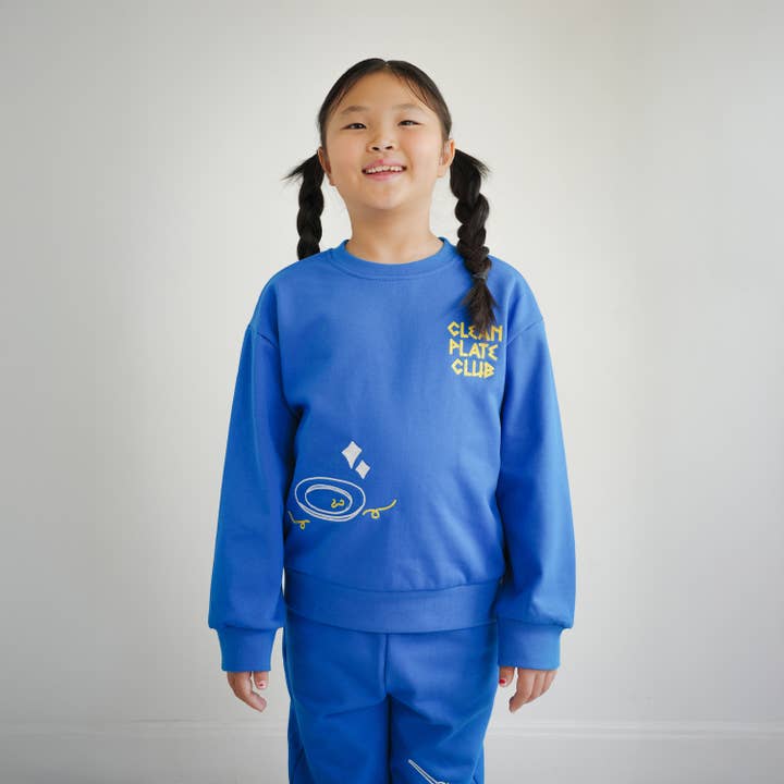 SWEAT-SHIRT ENFANT AVEC BRODERIE CLEAN PLATE CLUB pour la vente par Brrr