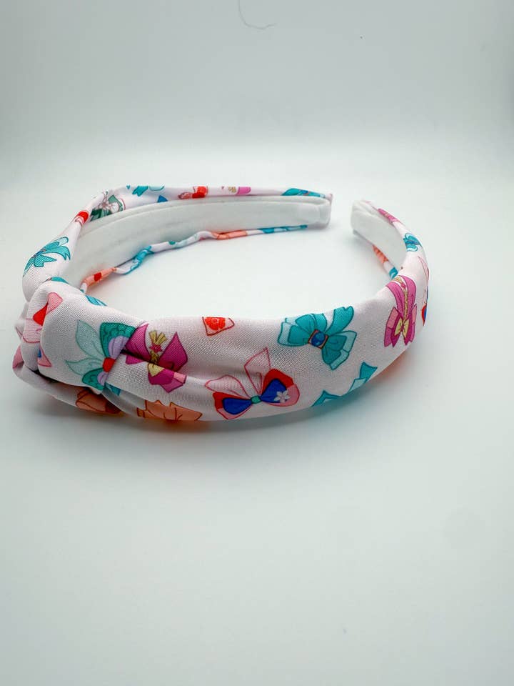 Serre-tête avec nœud de princesse pour la vente par Sweet Adeline